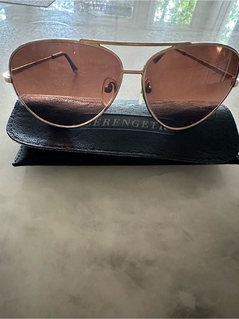 Serengeti Gold Aviator Sunglasses with Pink Lenses